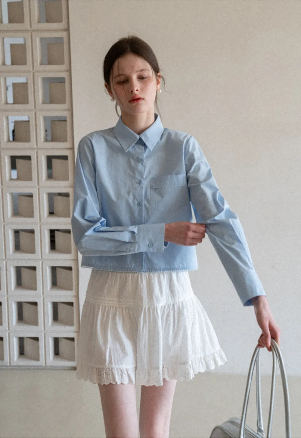 Long sleeve button front shirt with scalloped hem