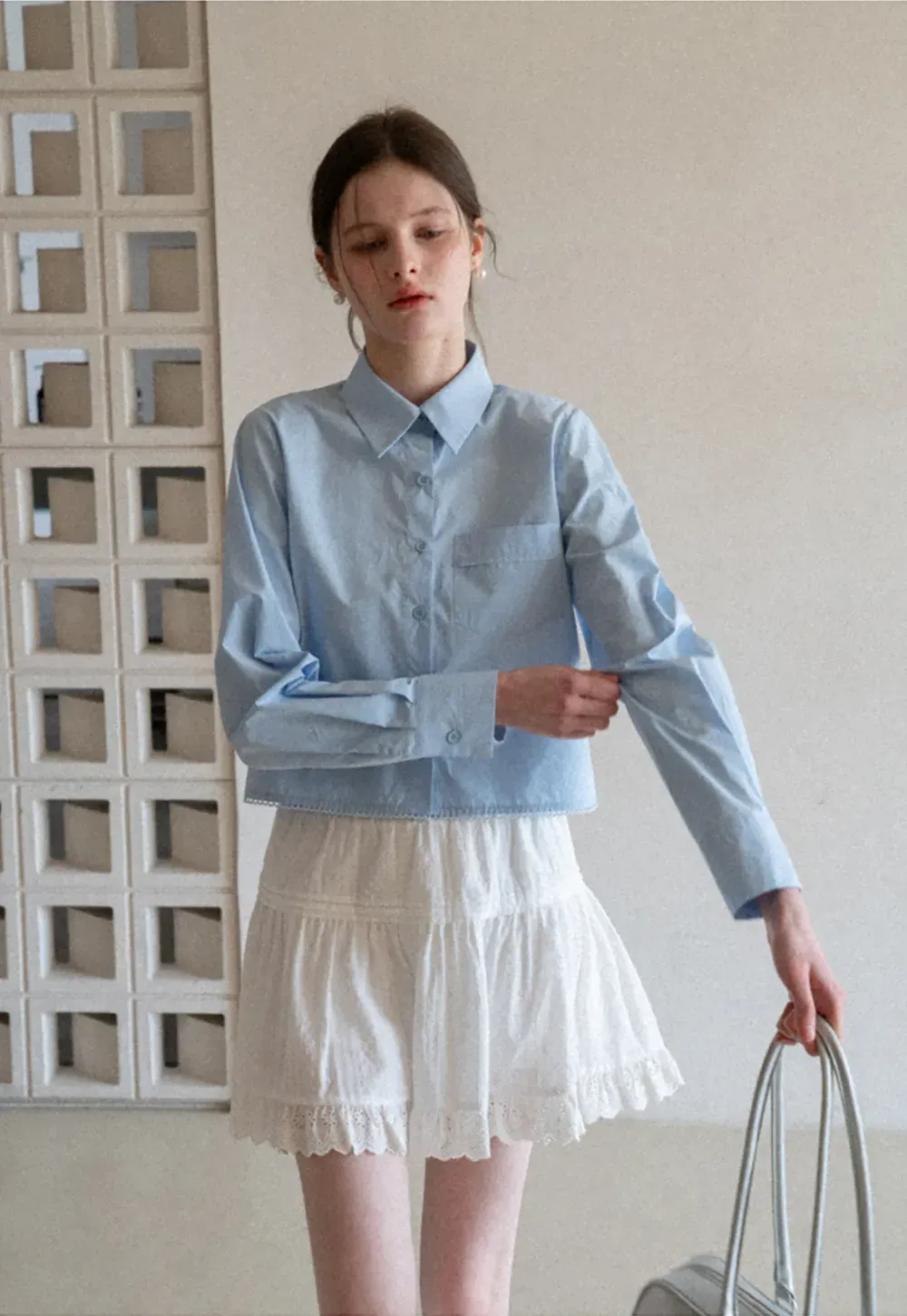 Long sleeve button front shirt with scalloped hem