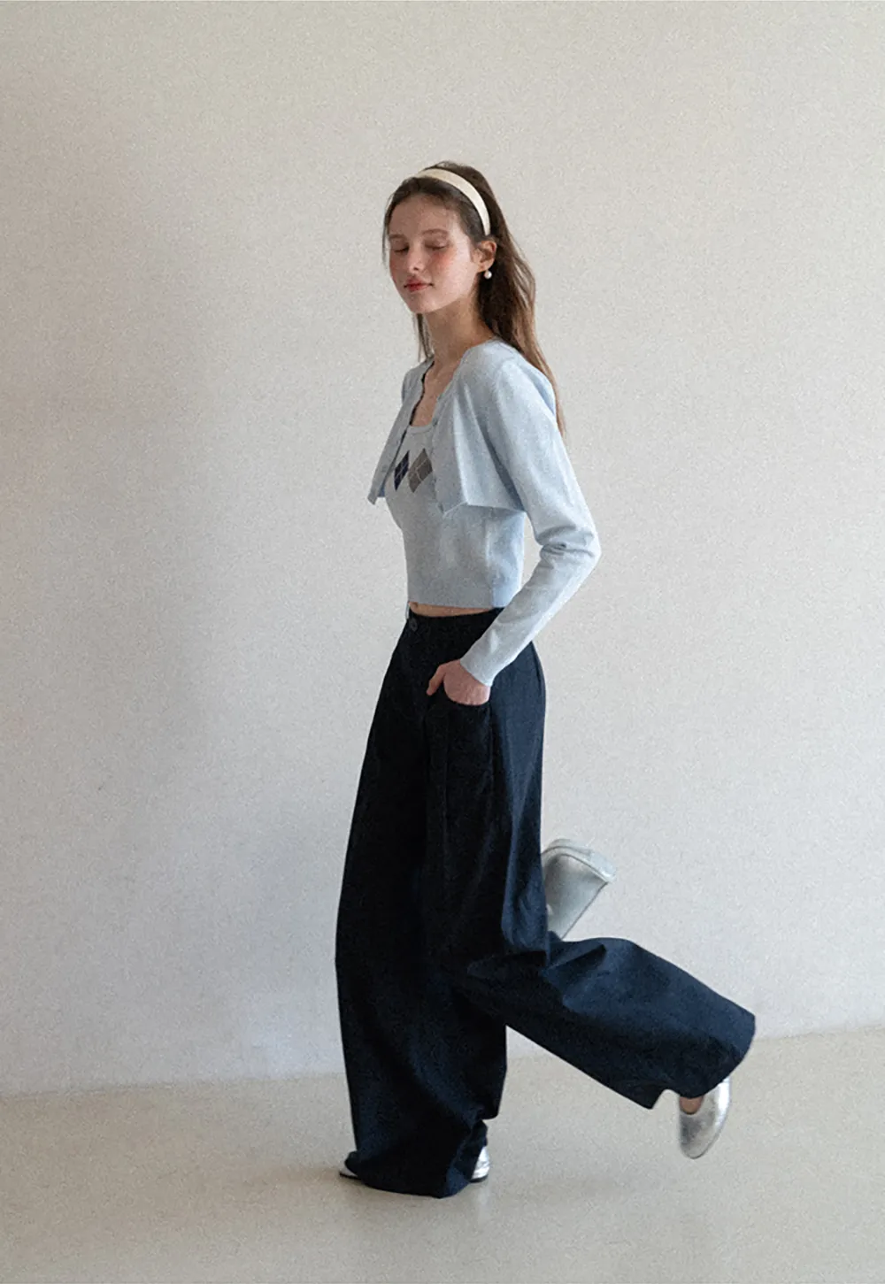 Woolen knit sweater with argyle pattern and buttons