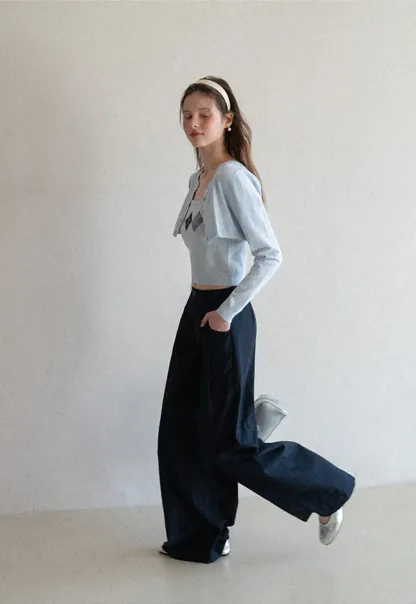 Woolen knit sweater with argyle pattern and buttons