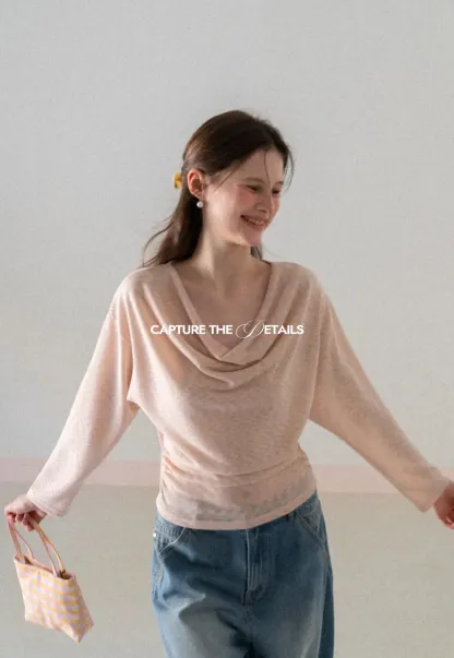 Long sleeve off shoulder draped knit top