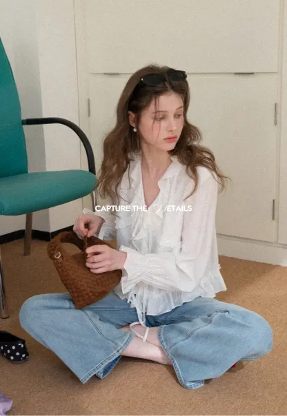 Elegant Blouse with Ruffle Detail and Tie Front Design