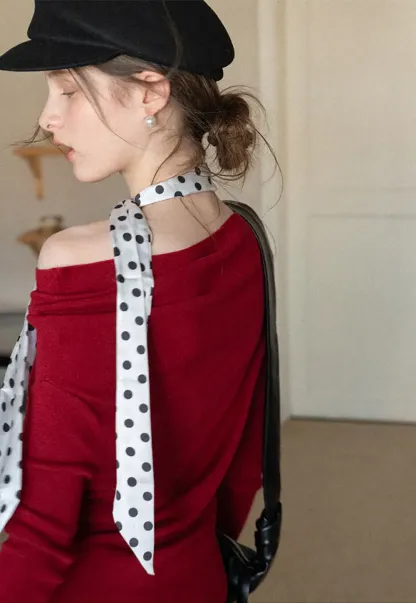 Elegant polka dot neck tie with bow design for women's fashion.