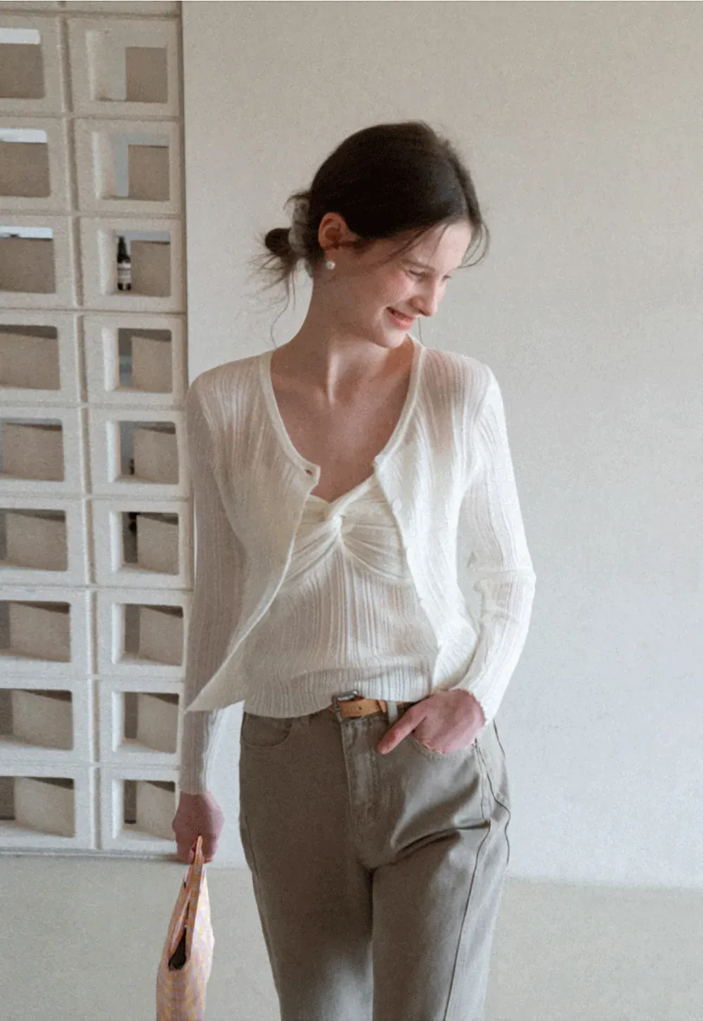 Ribbed knit sweater with V neckline and long sleeves