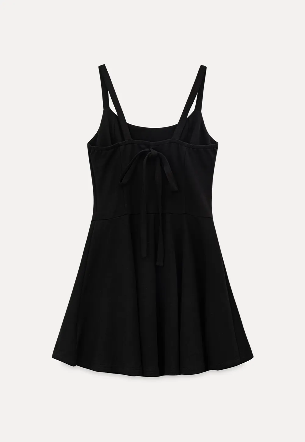 Sleeveless dress with thin straps and flared skirt