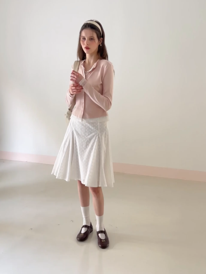 Flared pleated skirt with subtle texture