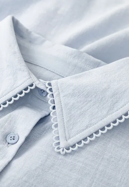 Lightweight long sleeve button front shirt with lace trim