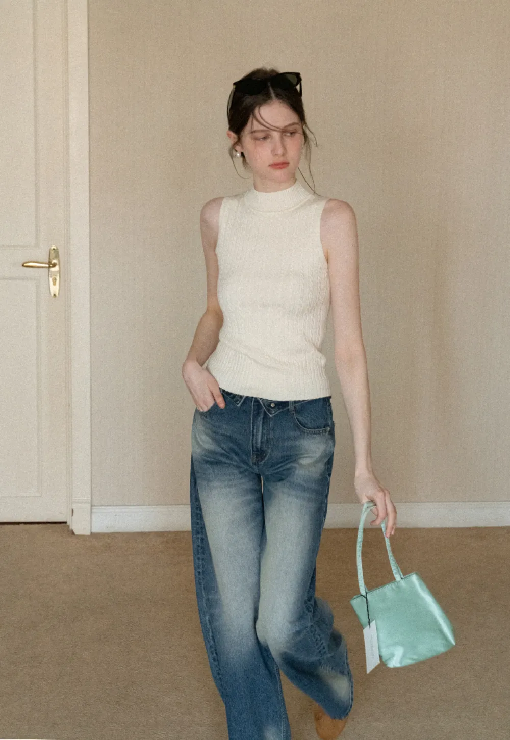 Cable Knit Sleeveless Top with High Neck Design