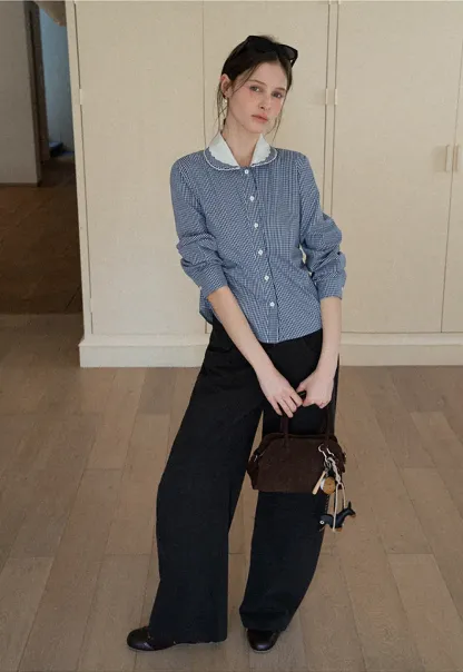 Elegant blouse with scalloped collar and long sleeves for versatile styling