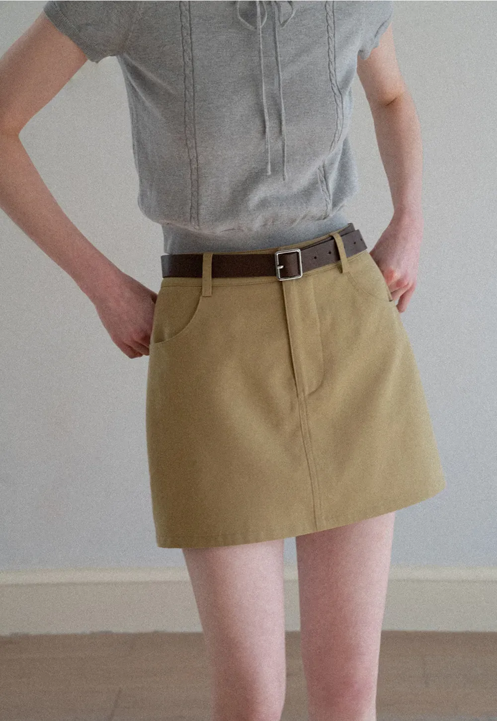 A-line mini skirt with front pockets and belt loops