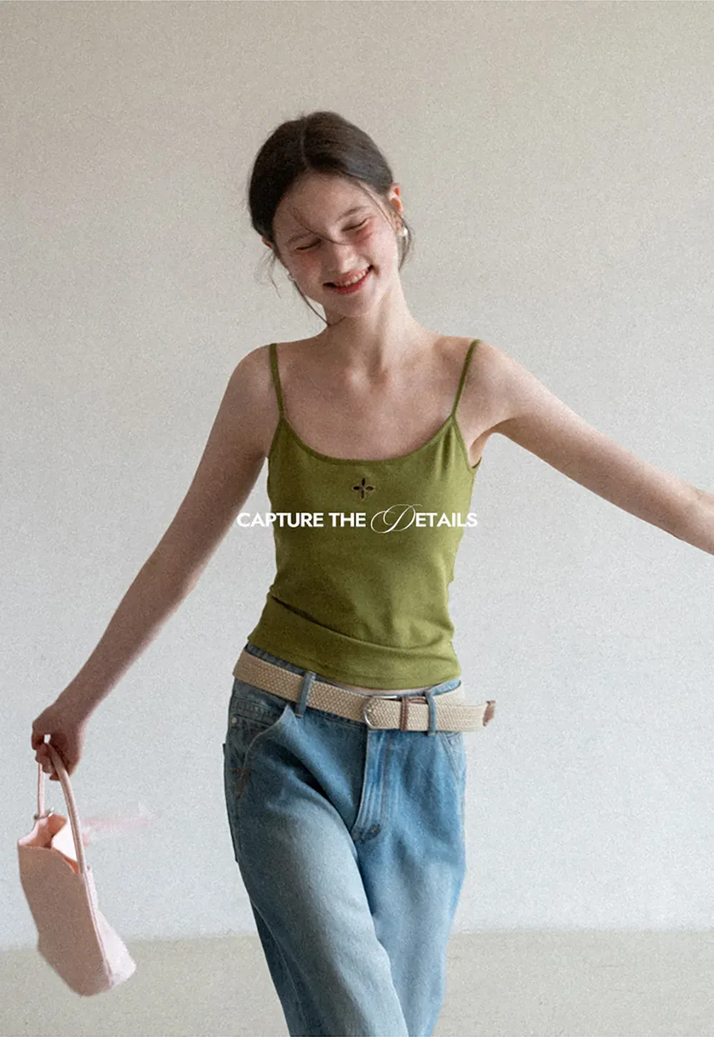 Gray tank top with small embroidered cross detail