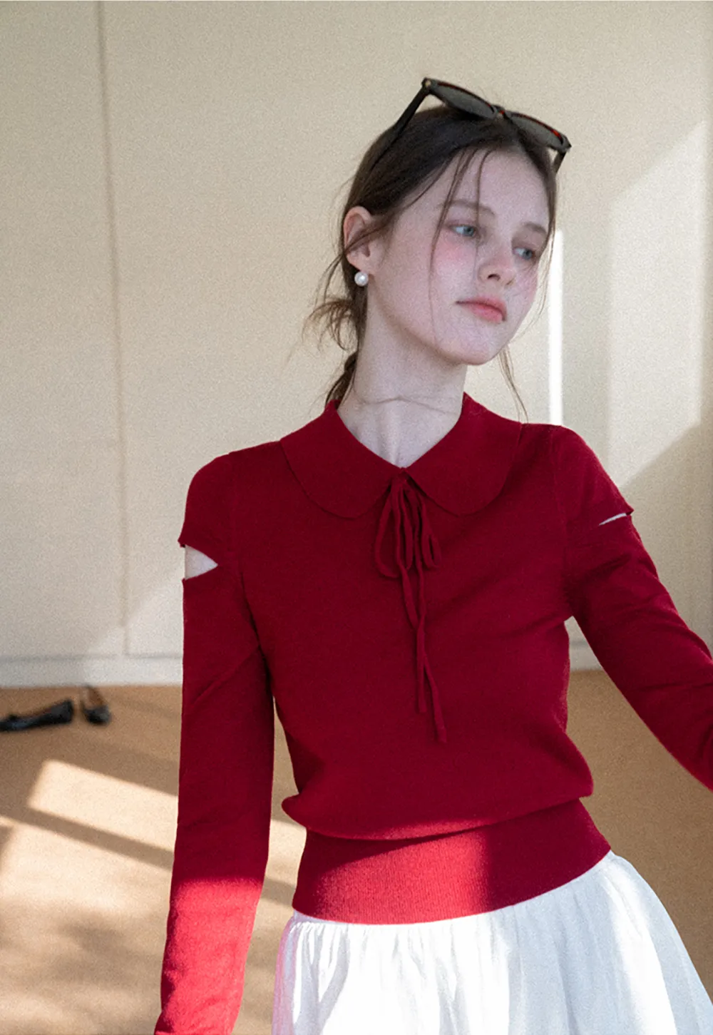 Elegant Knit Sweater with Bow Detail and Cutout Sleeves