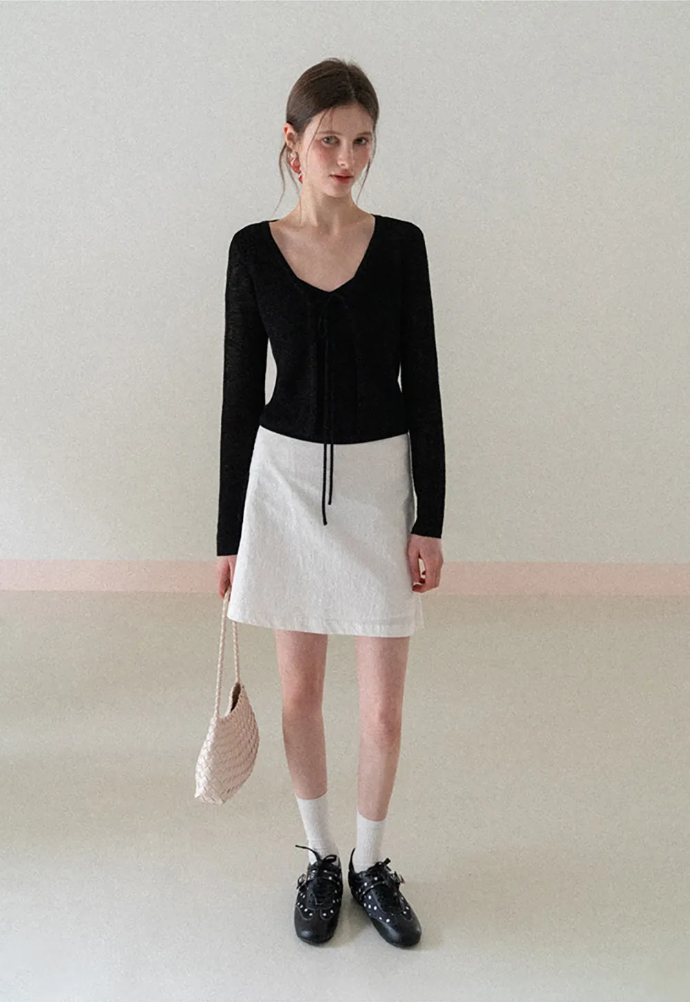 A-line mini skirt with front darts and clean hem