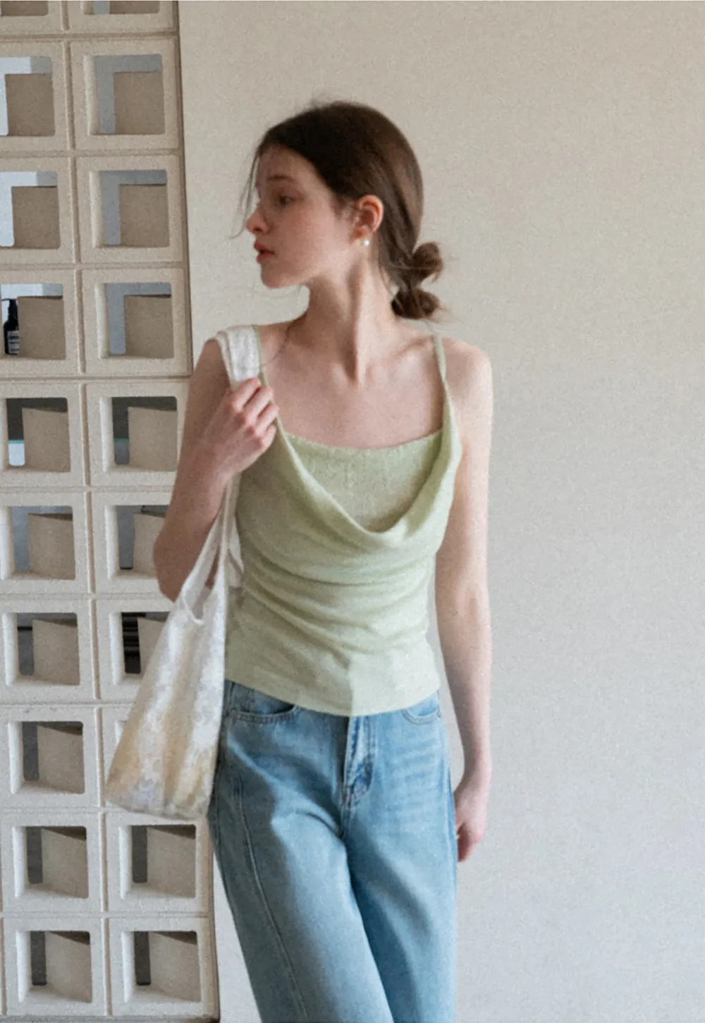 Silk-like tank top with thin straps and draped neckline