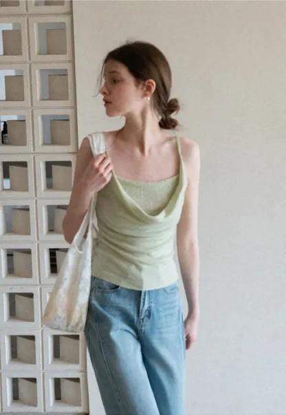 Silk-like tank top with thin straps and draped neckline