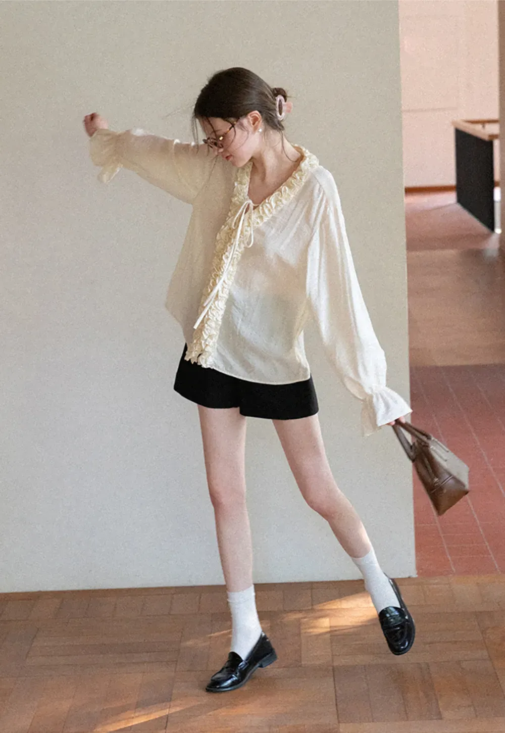 High waist pleated shorts with flared hem