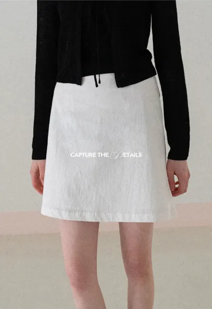 A-line mini skirt with front darts and clean hem