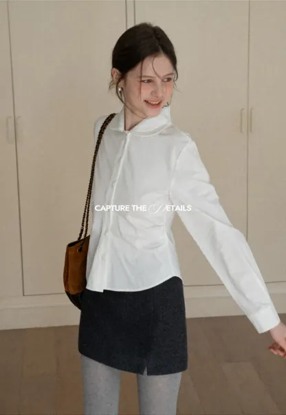 A-line mini skirt with textured fabric and central seam design