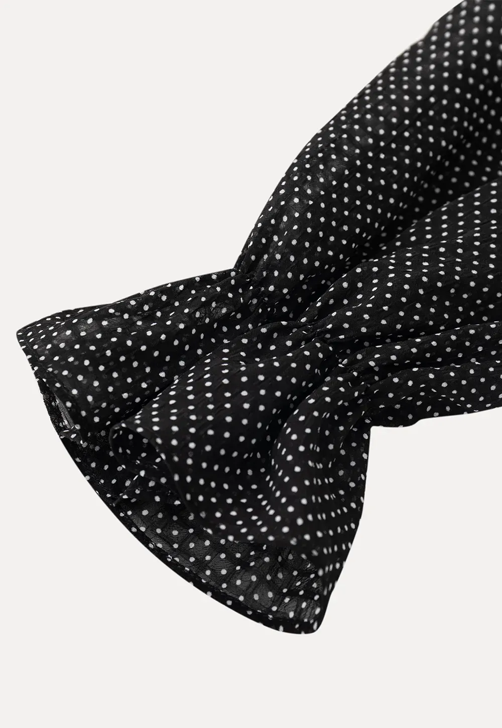 Polka Dot Sheer Blouse with Ruffled Hem and Tie Neck