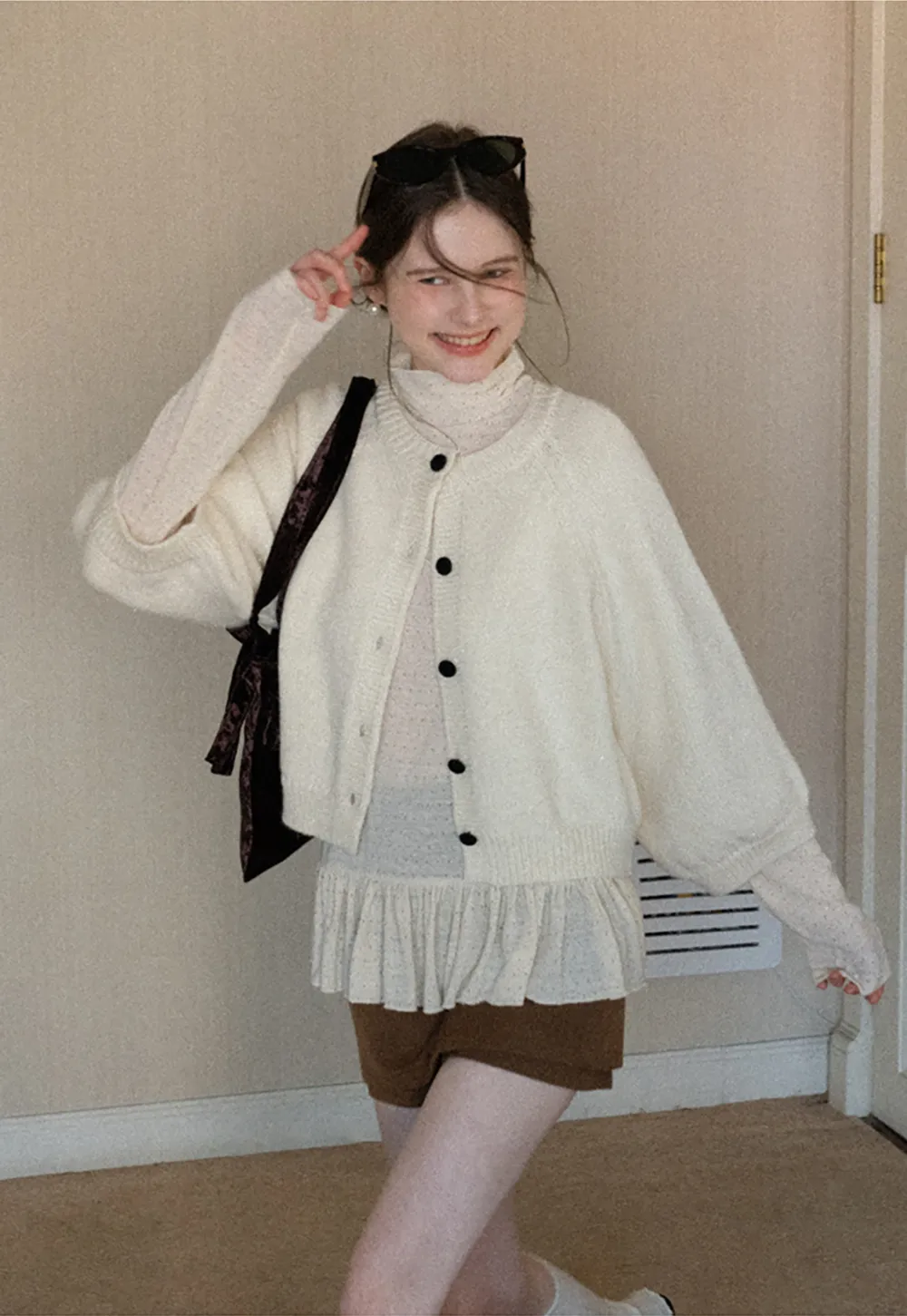 Soft knit cardigan with button front and relaxed fit