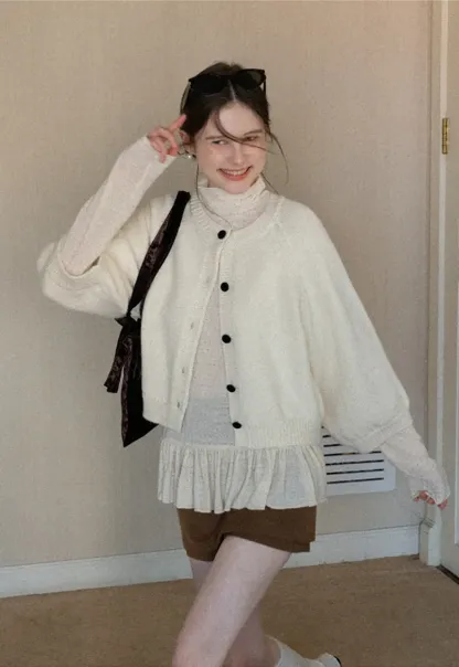 Soft knit cardigan with button front and relaxed fit