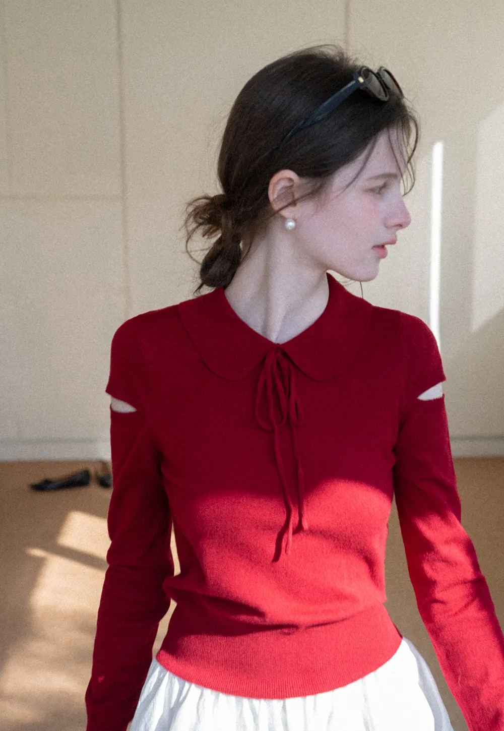 Elegant Knit Sweater with Bow Detail and Cutout Sleeves