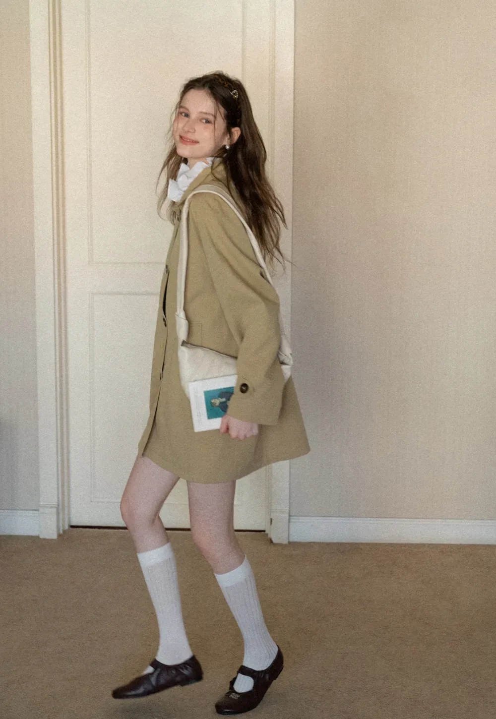 Elegant Trench Coat with Button Detailing and Pockets