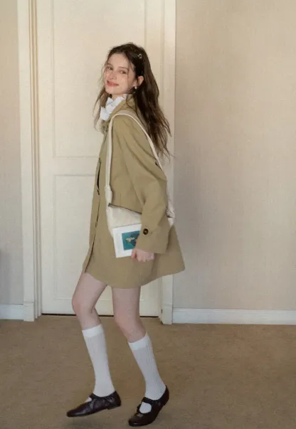 Elegant Trench Coat with Button Detailing and Pockets