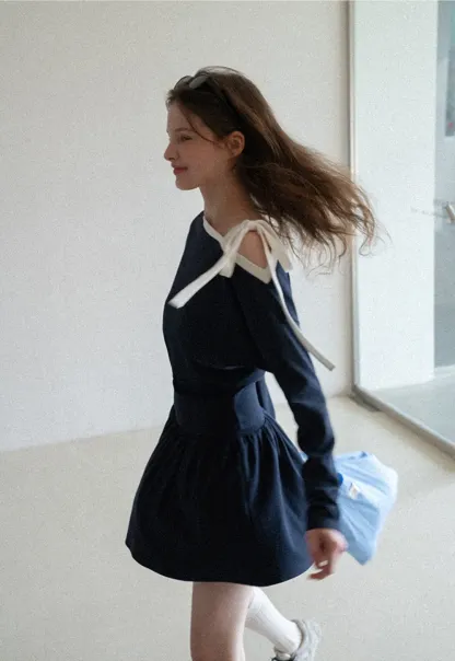 Long sleeve top with bow detail and mini skirt set