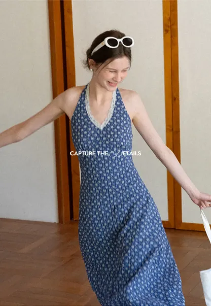 Halter neck dress with floral print and lace trim