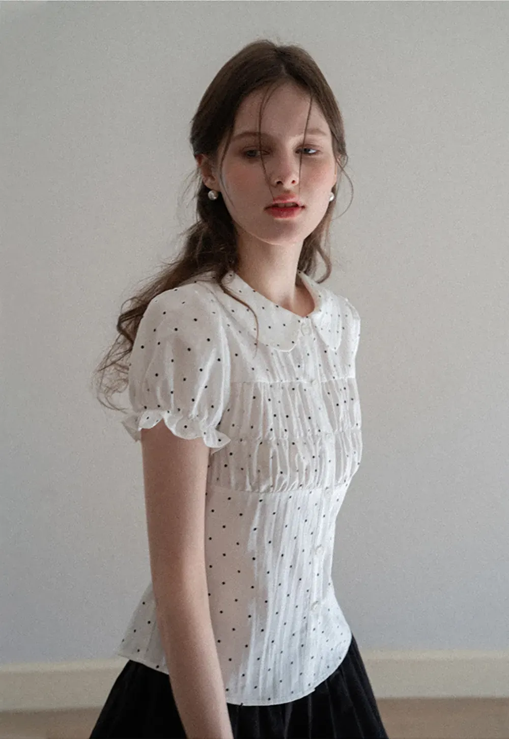 Polka dot shirt with ruffled sleeves and Peter Pan collar