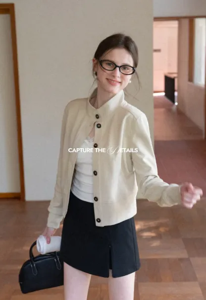 Short jacket with button front and ribbed cuffs