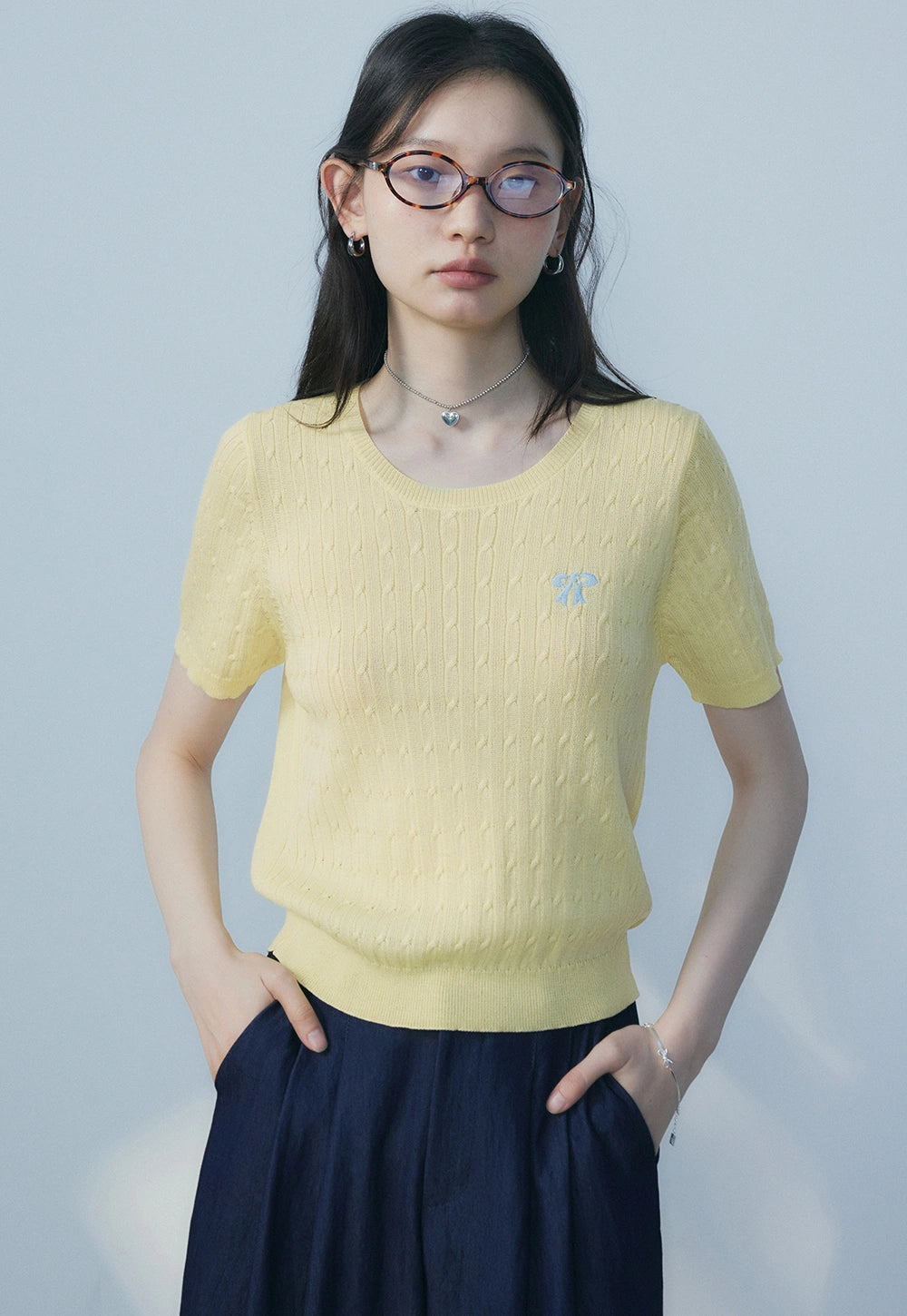 Women's detailed textured knit top