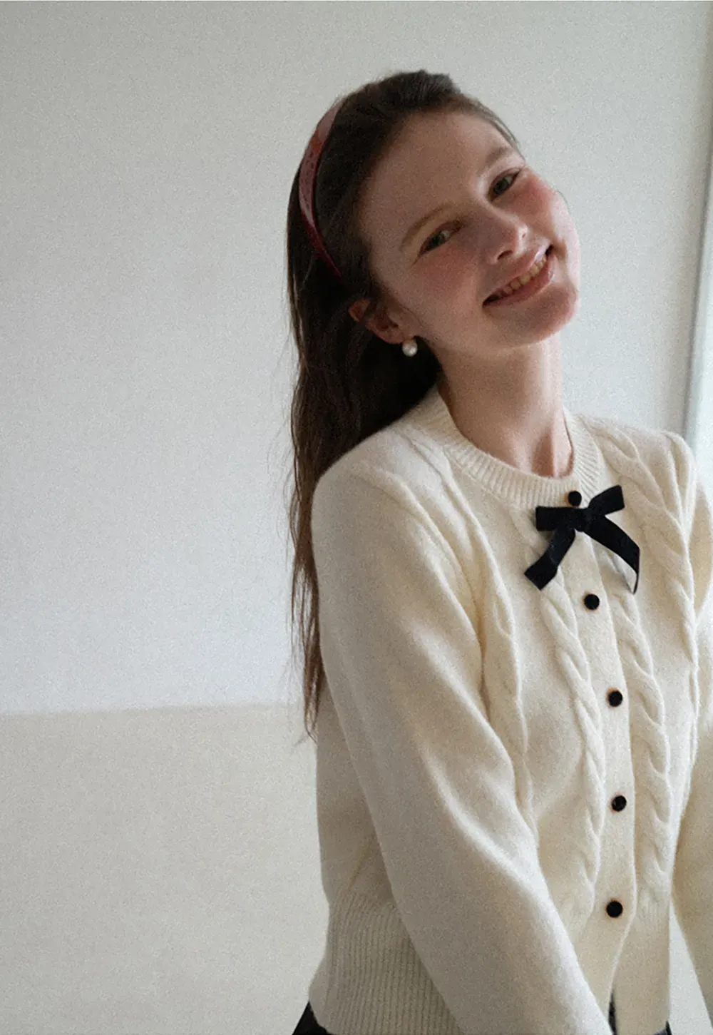 Elegant Cable Knit Cardigan with Bow Detail