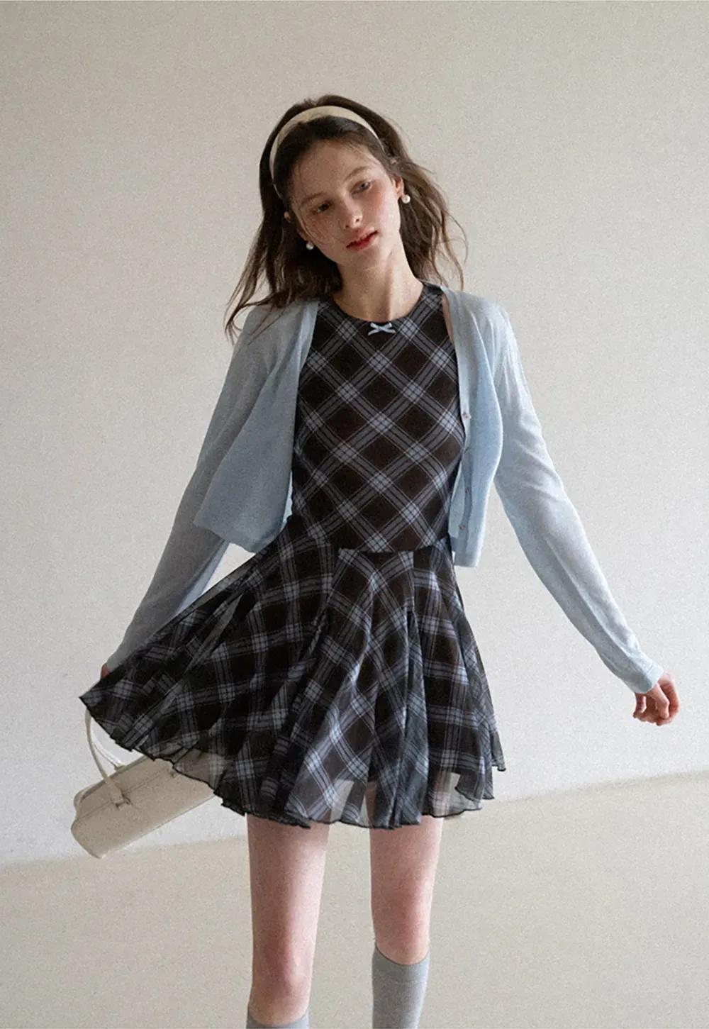 Plaid sleeveless dress with flared skirt