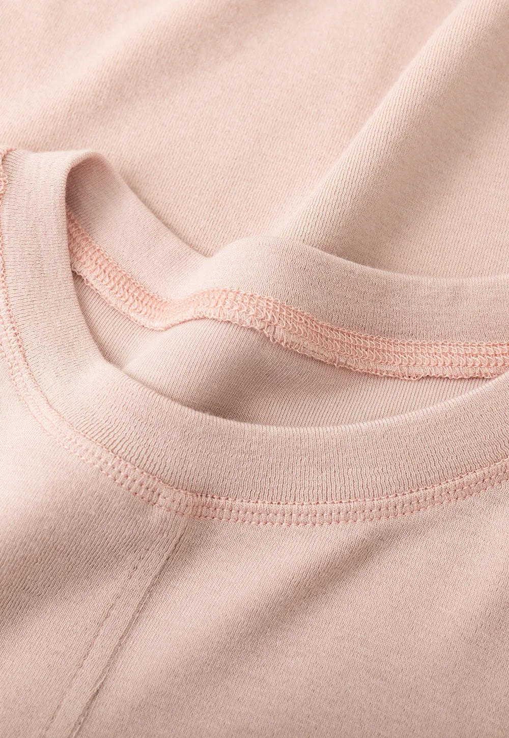 Long sleeve top with ruffled hem and layered design