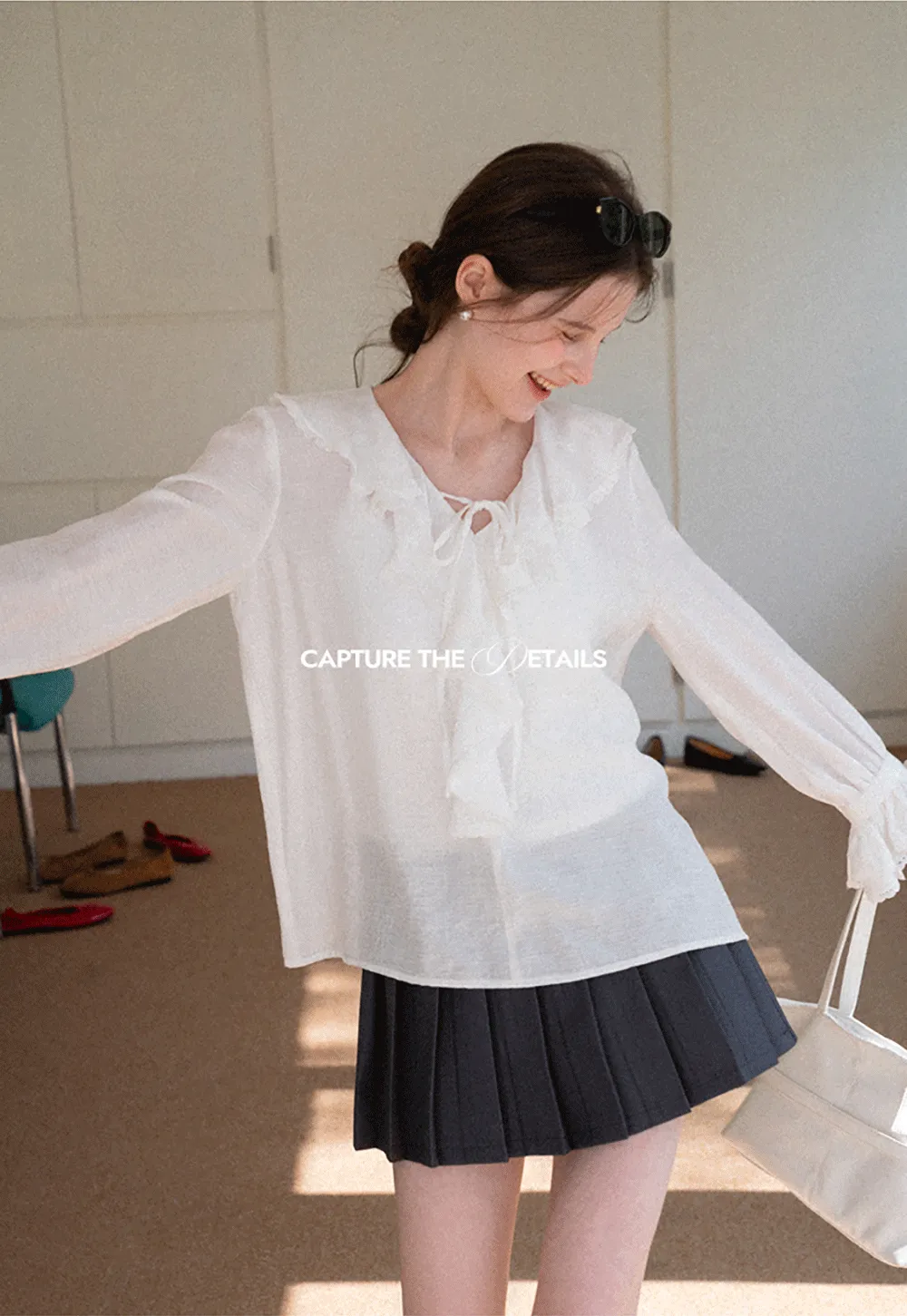 Elegant Blouse with Ruffled Neckline and Flared Sleeves