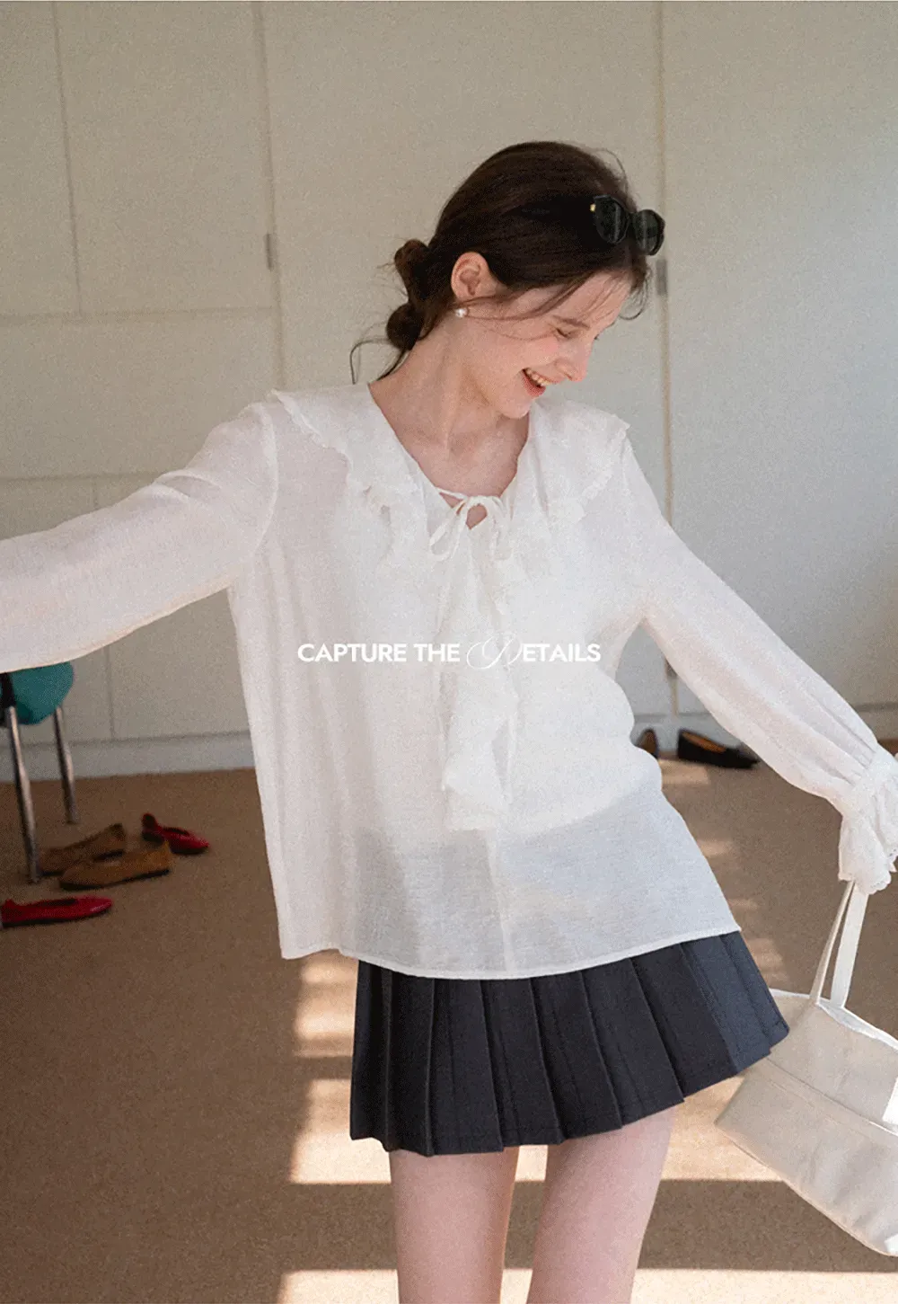 Elegant Blouse with Ruffled Neckline and Flared Sleeves