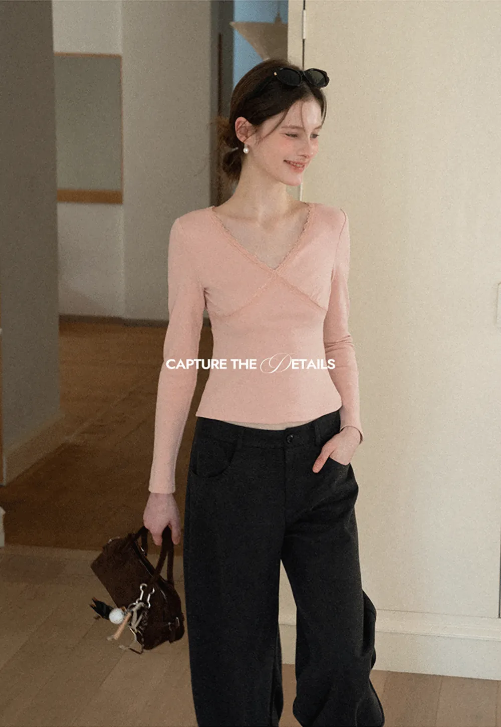 V neck long sleeve top with lace trim and fitted design