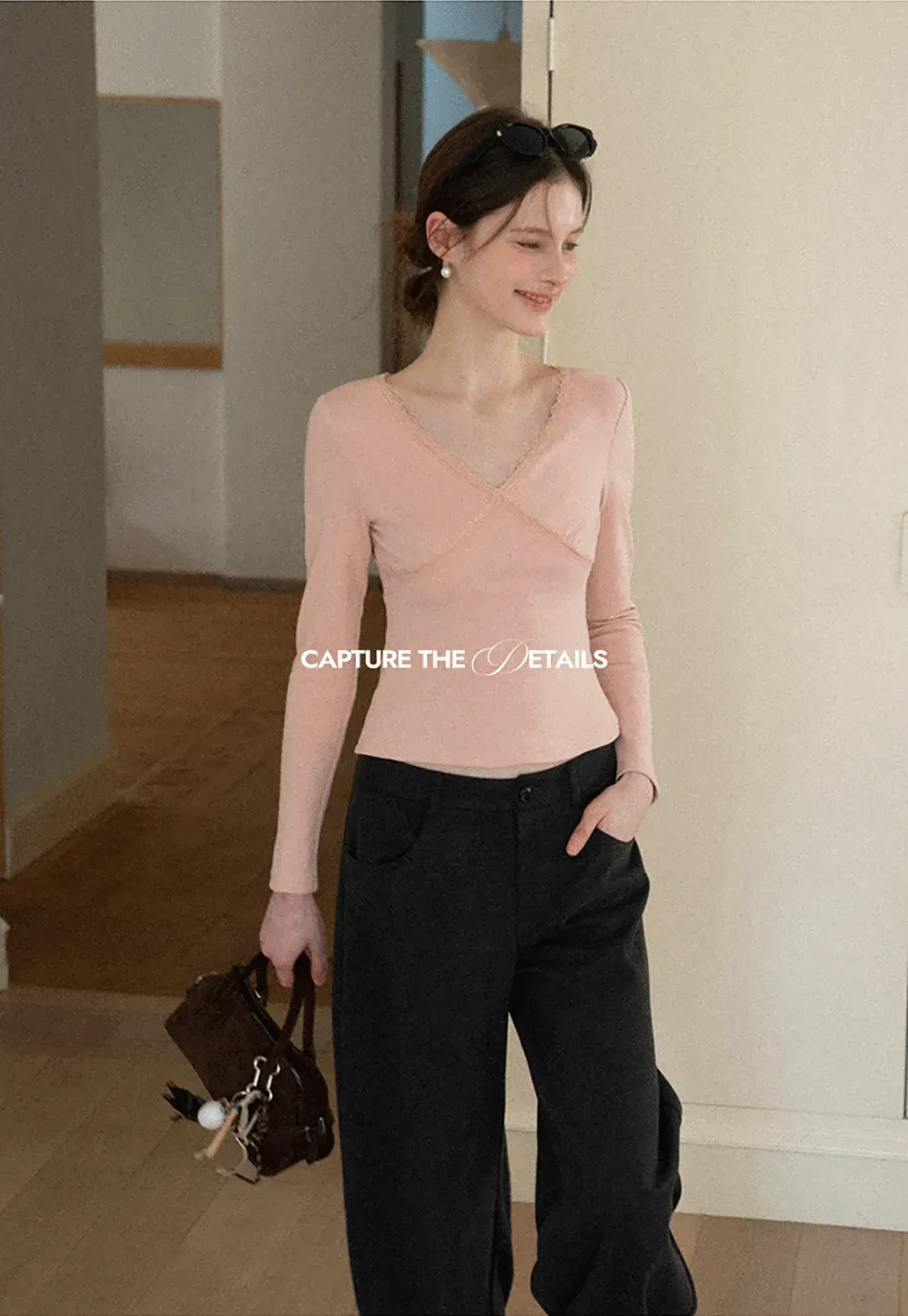 V neck long sleeve top with lace trim and fitted design