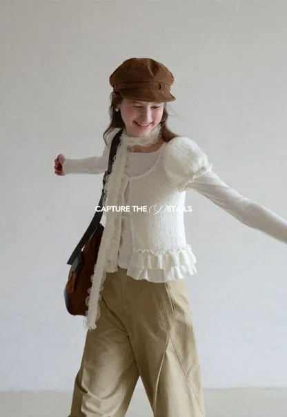 floral lace top with puffed sleeves and ruffled hem