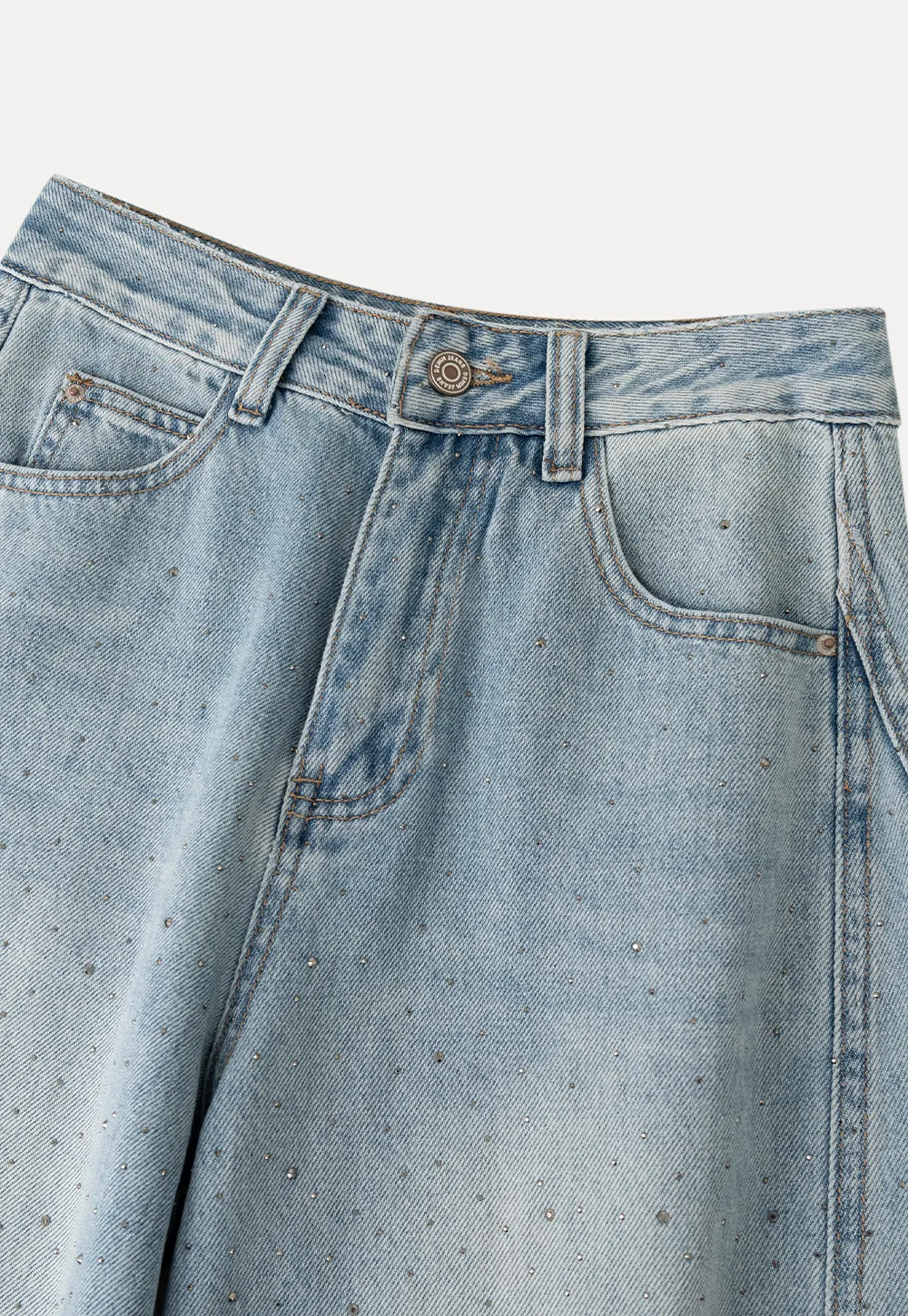 Wide leg jeans with subtle dot embellishments