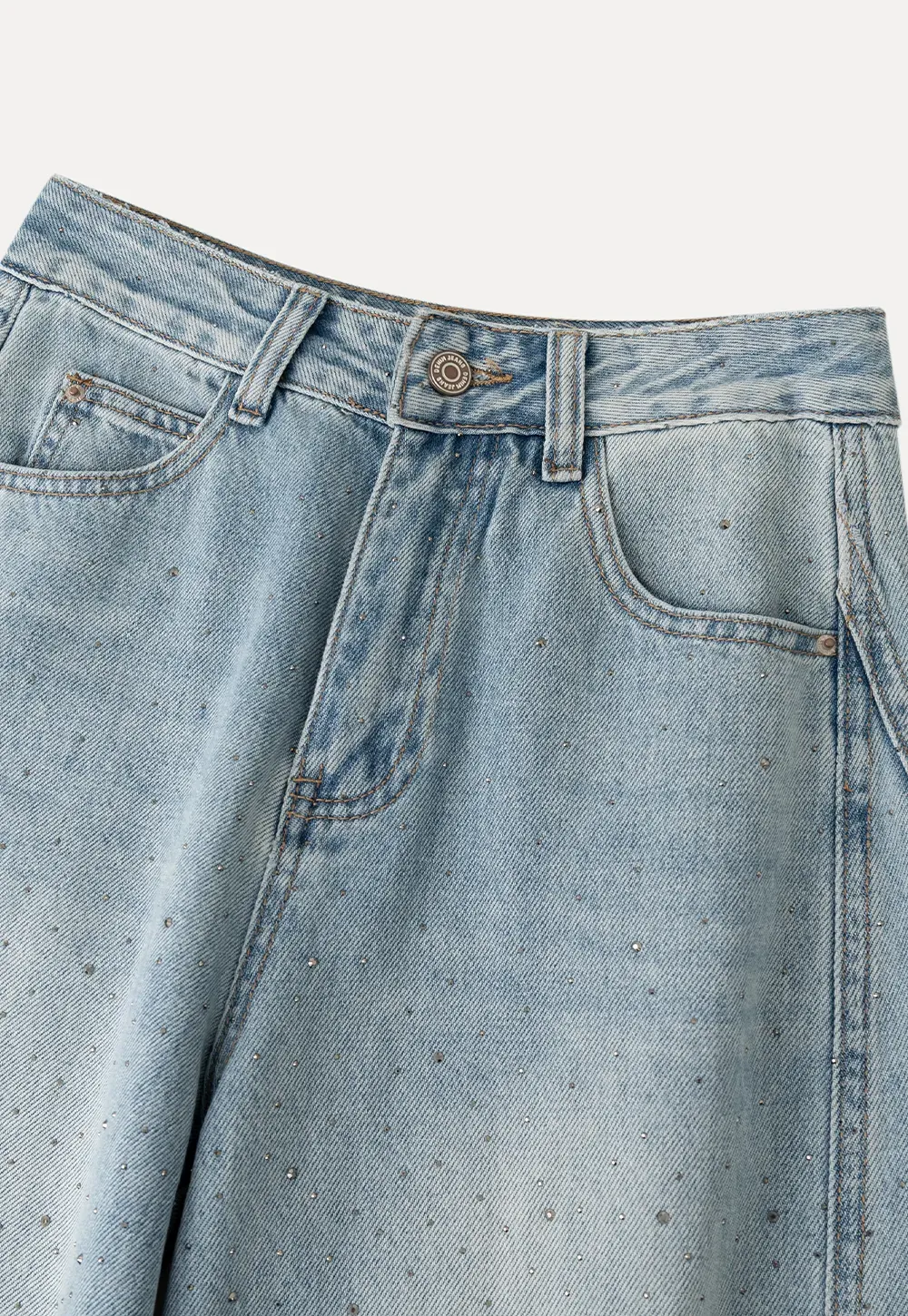 Wide leg jeans with subtle dot embellishments