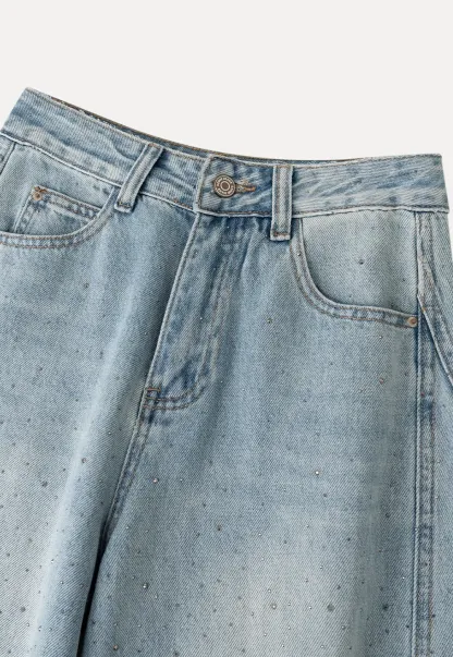 Wide leg jeans with subtle dot embellishments