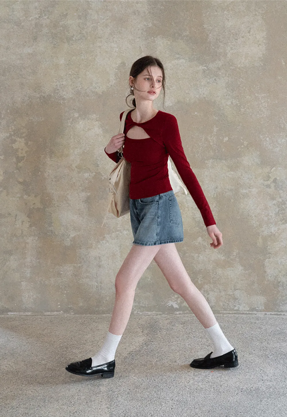 Long sleeve top with front cutout detail