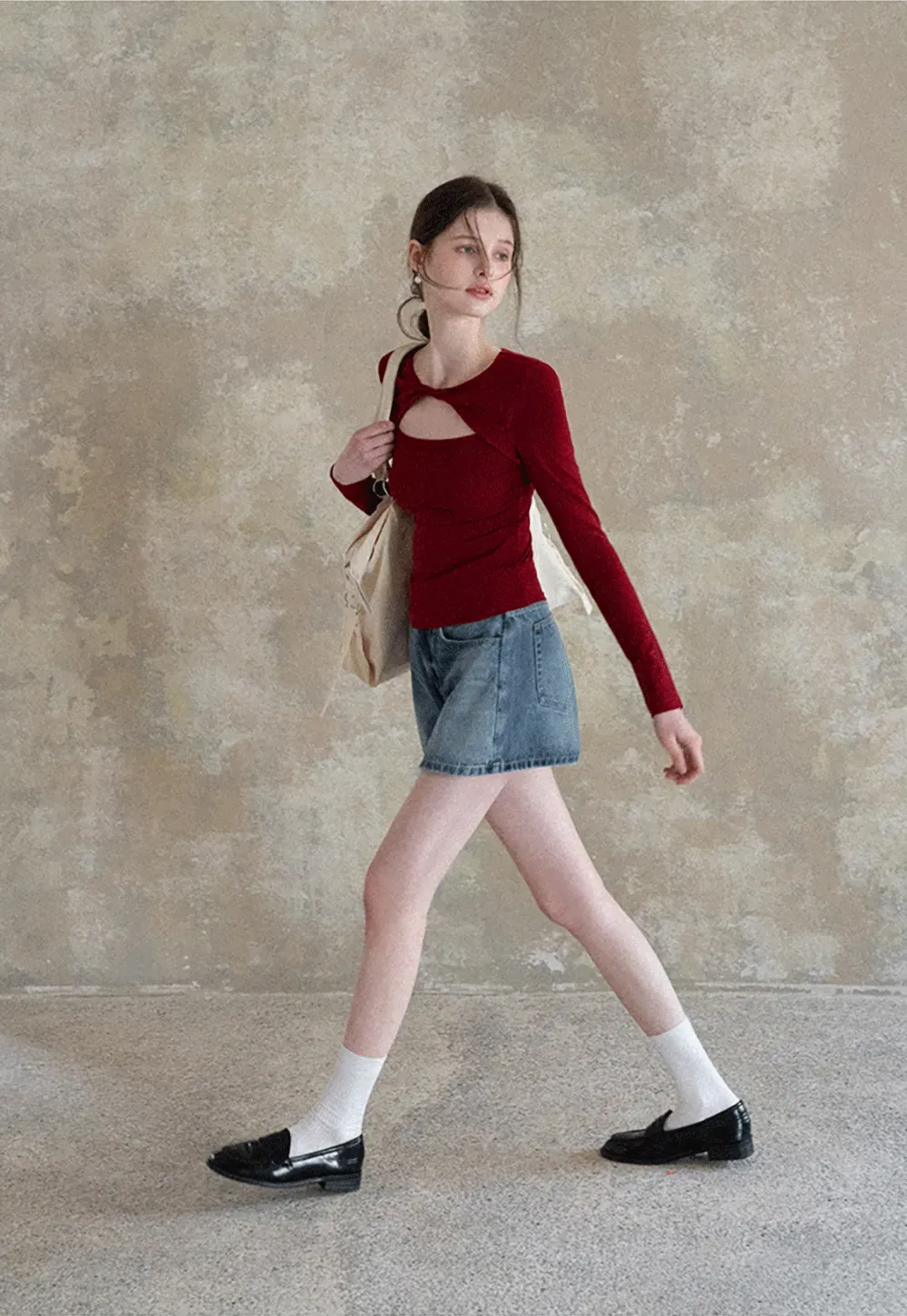 Long sleeve top with front cutout detail