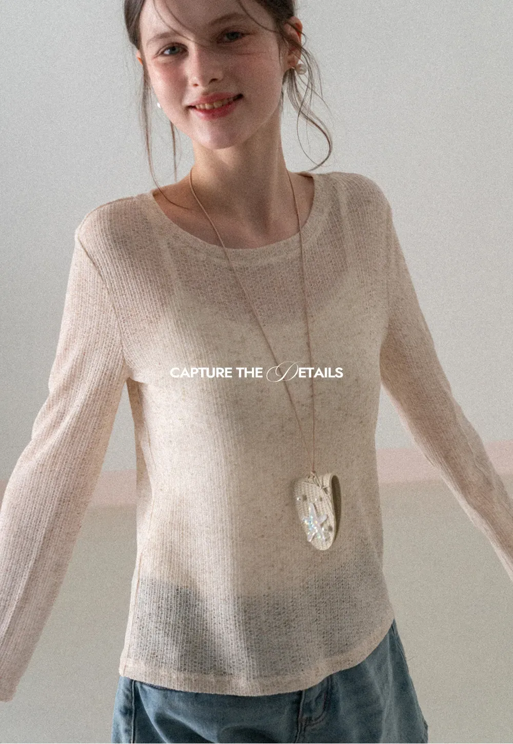 Long sleeve sheer knit top with round neckline