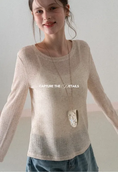 Long sleeve sheer knit top with round neckline