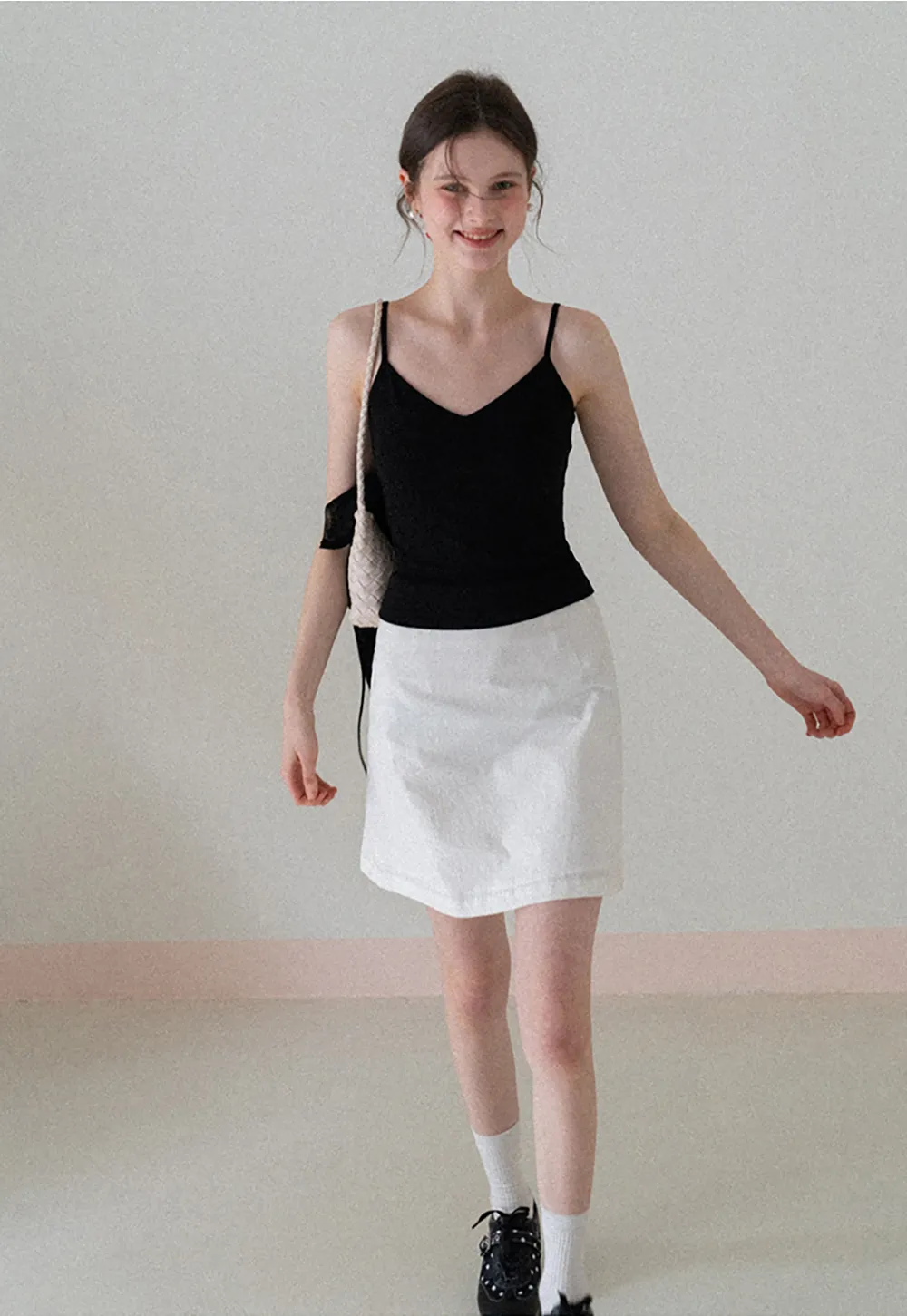 A-line mini skirt with front darts and clean hem