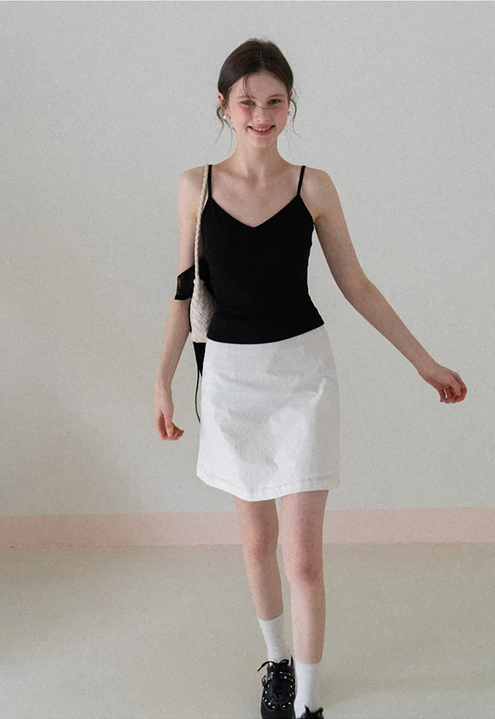 A-line mini skirt with front darts and clean hem